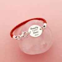 Bratara banut cu mesaj - Family is where love grows - Argint 925, piele rosie impletita