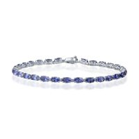 Bratara tennis din aur alb cu tanzanite ovale de 6.3ct