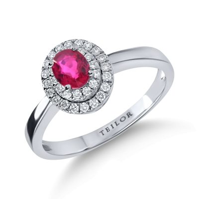 Inel din aur alb cu un rubin oval si diamante de 0.7ct