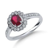 Inel din aur alb cu un rubin oval si diamante de 1ct